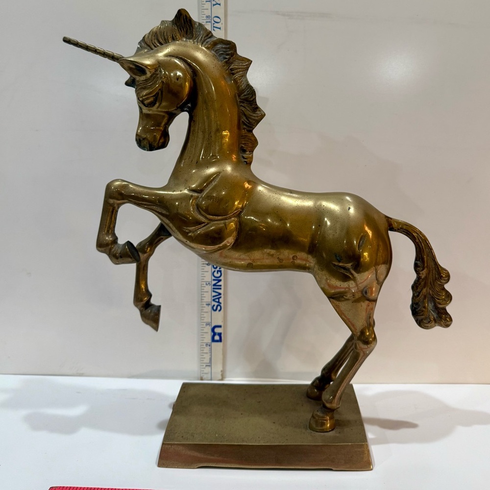 Elegant Gold Unicorn Sculpture
